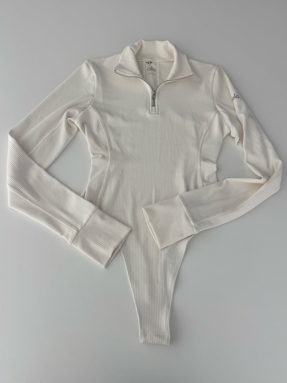 Cream Alo Yoga Ribbed Zipfront Longsleeve Bodysuit